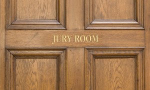 Old oak entrance door ot Grand Jury Room in Crown Court